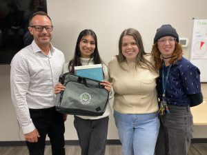 BGC Okanagan CEO standing with Youth of the Year Mehak Parihar and two other staff members.